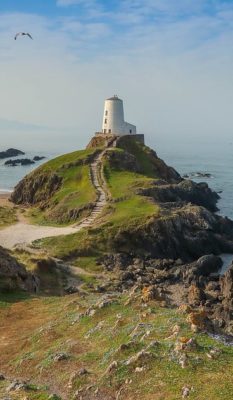 Picture of a lighthouse tower on a hill